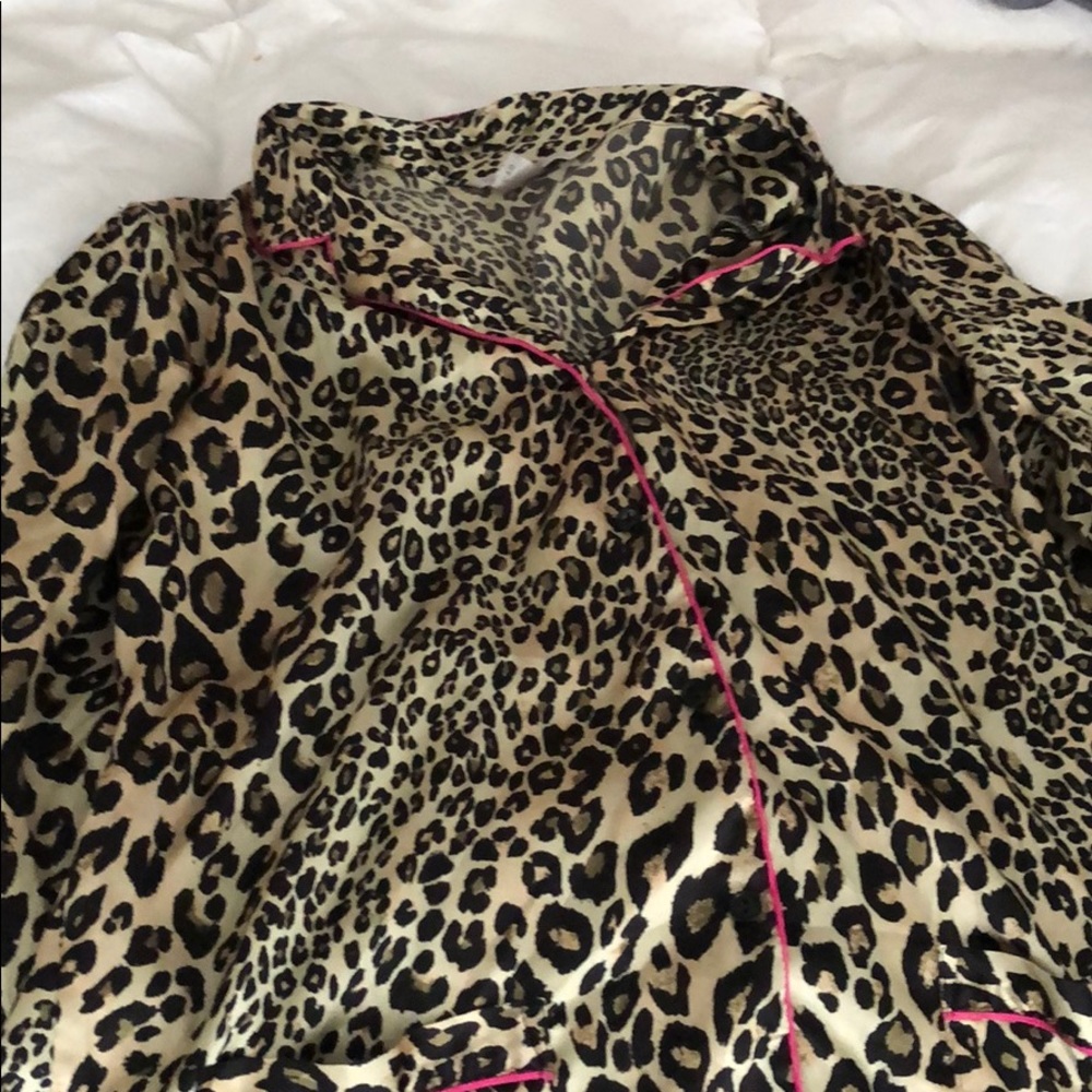 Leopard pajamas with pink trim!